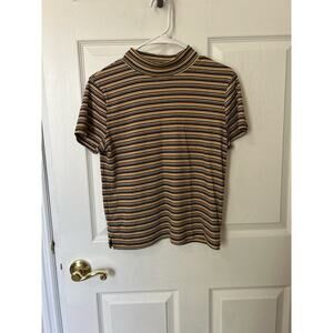 Ribbed mock neck shirt.
